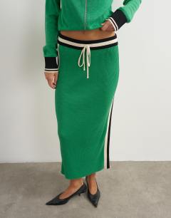 Model wearing Knitted wool blend sporty pencil contrast panel co-ord skirt in green