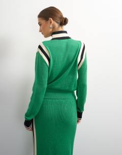 Model wearing Knitted wool blend zip through funnel neck contrast panel co-ord jacket in green