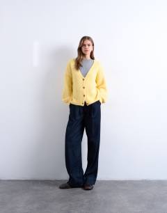 Model wearing Knitted wool brushed fluffy v neck cardigan in yellow