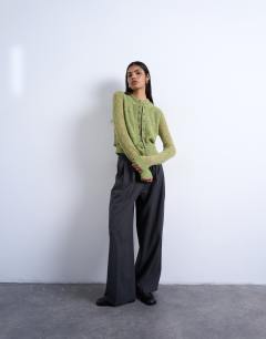 Model wearing Knitted wool double layer cardigan in green