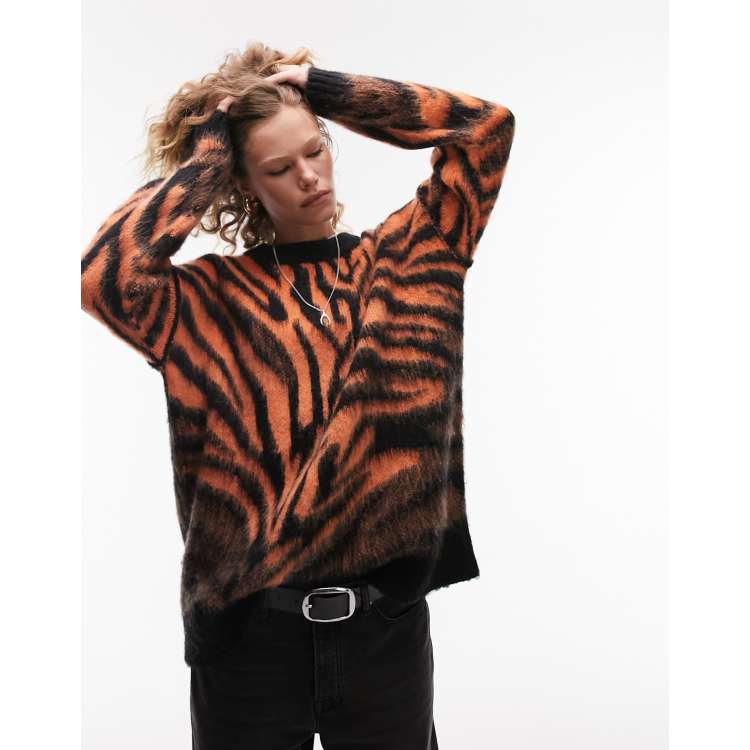 Topshop knitted zebra print fluffy jumper in orange ASOS