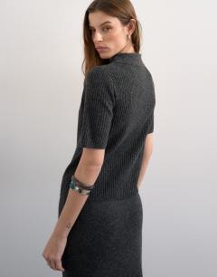 Model wearing Knitted zip through polo top co-ord in charcoal