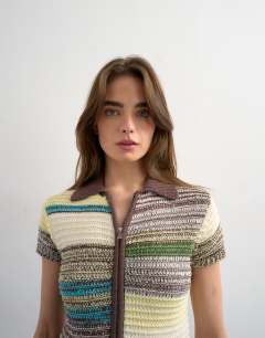 Model wearing Knitted zip through stripe polo in yellow