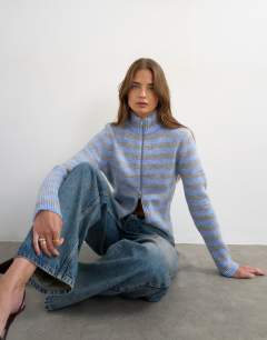 Model wearing Knitted zip up cardigan in grey and blue stripe