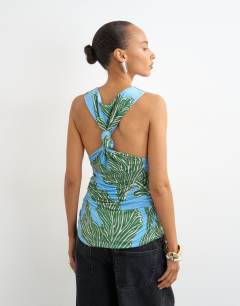 Model wearing Knot back detail microfibre top in blue