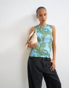 Model wearing Knot back detail microfibre top in blue