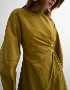 Model wearing Knot detail midi dress with asymmetric hem in khaki