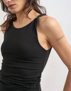 Model wearing Knot detail ruched side tank in black