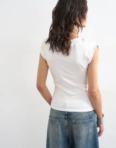 Model wearing Knot detail tee in white