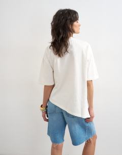 Model wearing Knot twist t-shirt in ecru