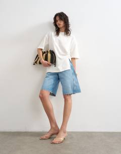 Model wearing Knot twist t-shirt in ecru