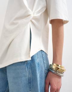 Model wearing Knot twist t-shirt in ecru