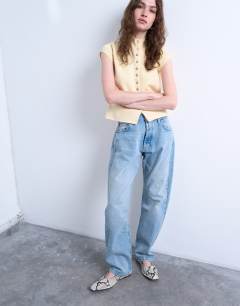 Model wearing Kort high rise straight jean in bleach