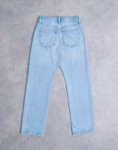 Model wearing Kort high rise straight jean in bleach