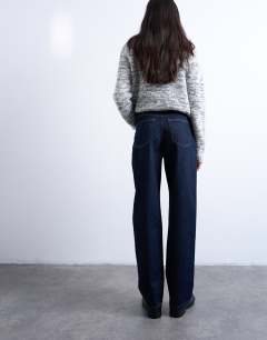 Model wearing Kort high rise straight jean in indigo rinse