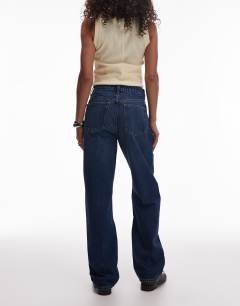 Model wearing Kort high rise straight jean in rich blue
