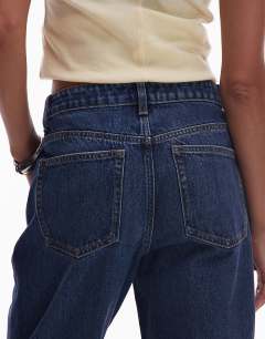 Model wearing Kort high rise straight jean in rich blue