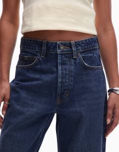 Model wearing Kort high rise straight jean in rich blue