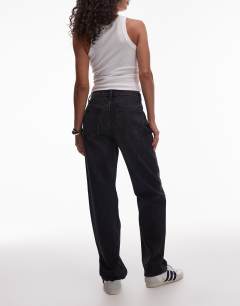 Model wearing Kort high rise straight jean in washed black 