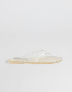 Model wearing Kylie jelly toe thong sandal in clear