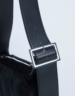 Model wearing Kylie nylon cross body with contrast strap in black