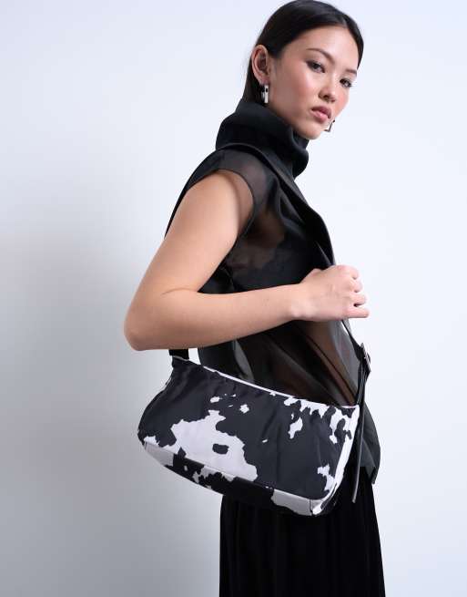 Topshop Kylie nylon cross body with contrast strap in cow print, 3 of 4