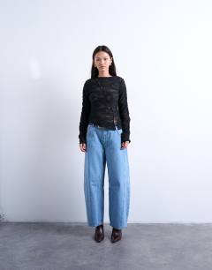 Model wearing Lace asymmetric top in black