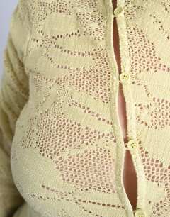 Model wearing Lace asymmetric top in yellow