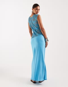 Model wearing Lace body maxi occasion dress in turquoise