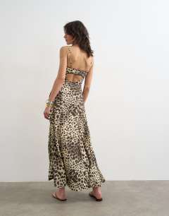 Model wearing Lace bust maxi dress in leopard print