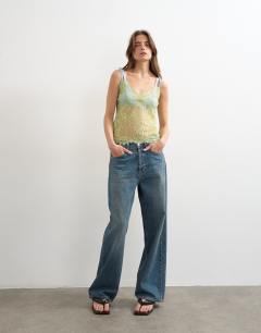 Model wearing Lace cami top in lime green with blue tipping