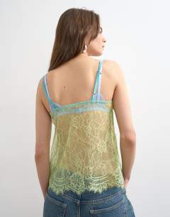 Model wearing Lace cami top in lime green with blue tipping