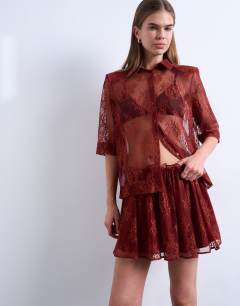 Model wearing Lace co-ord elasticated waist skirt in rust
