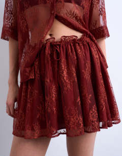 Model wearing Lace co-ord elasticated waist skirt in rust