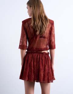 Model wearing Lace co-ord elasticated waist skirt in rust