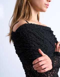 Model wearing Lace deep fold bardot long sleeve top in black