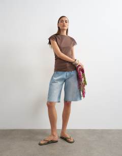 Model wearing Lace detail cap sleeve tee in chocolate