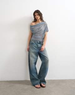 Model wearing Lace fallen shoulder top in blue