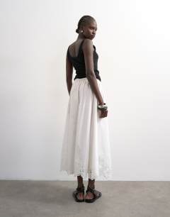 Model wearing Lace hem full circle maxi skirt in ivory