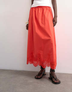 Model wearing Lace hem full circle maxi skirt in red