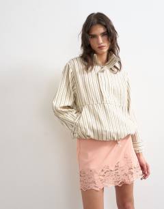 Lace hem wrap mini skirt in pink