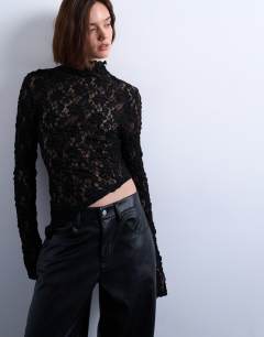 Lace high neck long sleeve asymmetric hem top in black