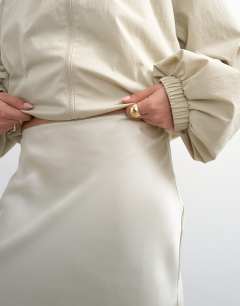 Model wearing Lace Insert awkward length midi skirt in ivory