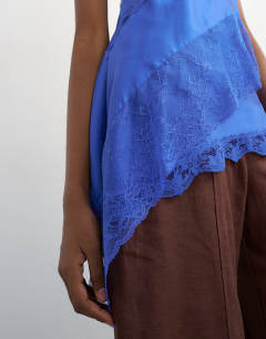 Model wearing Lace insert cami top in cobalt