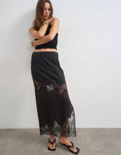 Model wearing Lace insert column maxi skirt in brown and black