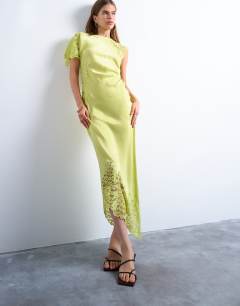 Model wearing Lace insert grown on shoulder midi dress in lime