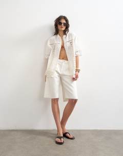 Model wearing Lace insert resort shirt in ivory