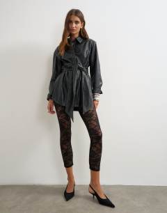 Model wearing Lace legging hosiery in black