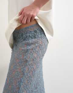 Model wearing Lace midi skirt in blue