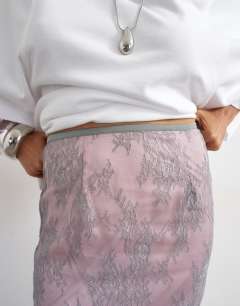 Model wearing Lace midi skirt with pink insert in grey